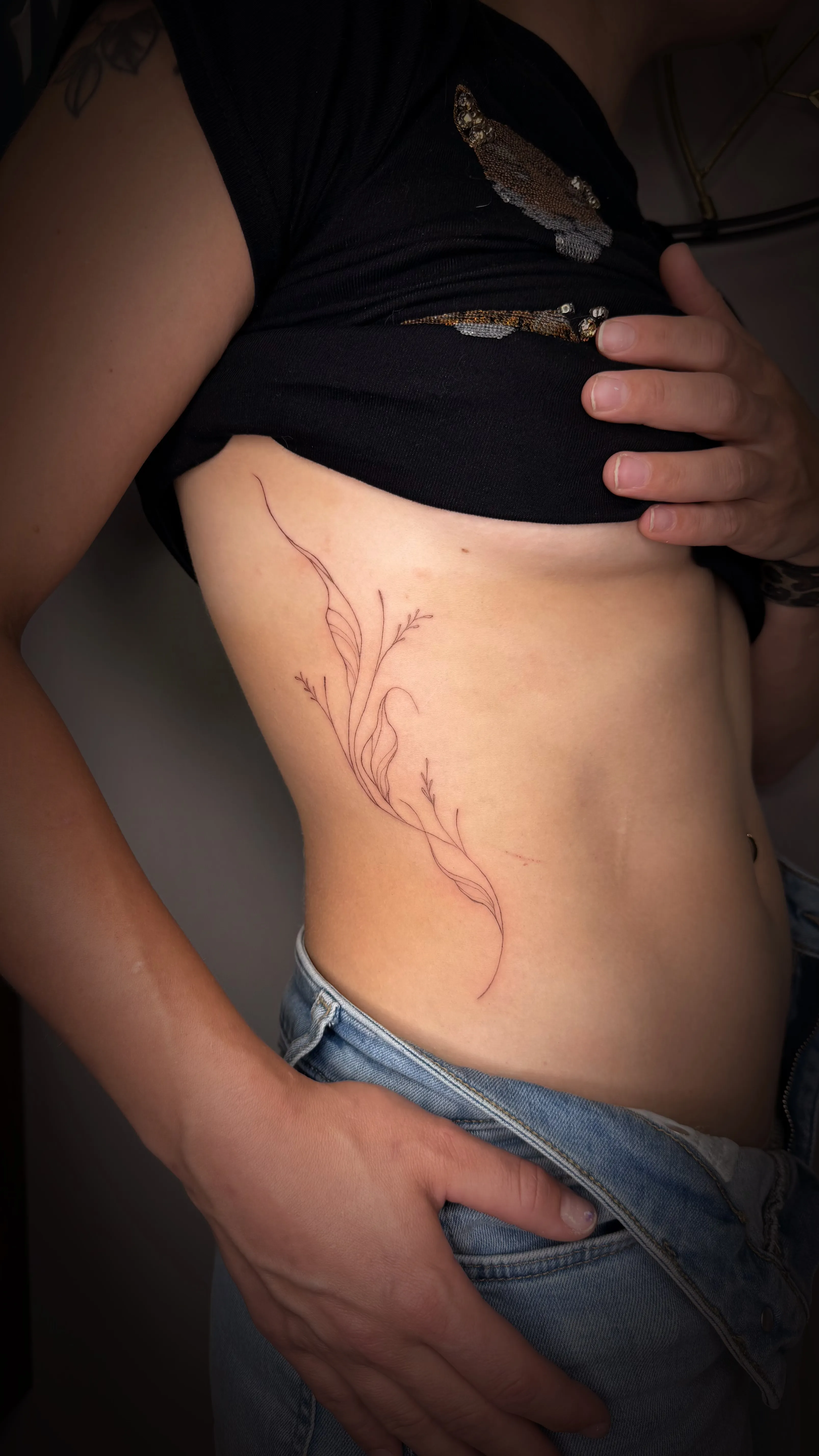 Voorbeeld van een fine line tattoo